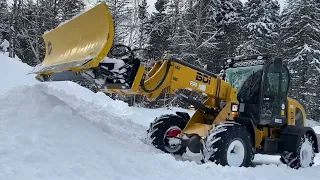 Plowing snow with my Fisher Plow and Chinese loader . BDI Equipment distributor .