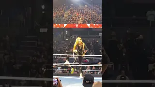 The Man Becky Lynch makes her way to the ring with the NXT Women’s Championship