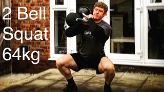 Single-Arm Double Kettlebell Squat (64kg)