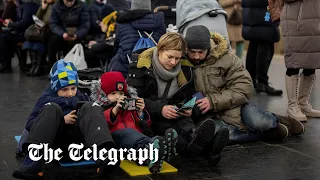 Barrage of Russian attacks force Kyiv residents to take shelter underground