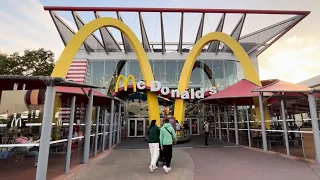 Eating McDonald’s at Disneyland Paris in Disney Village (so good chocolate got on the face!)