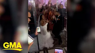 Watch these newlyweds surprise their guests with a creative entrance l GMA