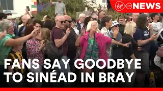 Large crowds have turned out in Bray to pay their respects at Sinéad O'Connor's funeral cortege