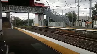 QR's 2413+2152 work a northbound railset thru Zillmere 03/12/2017.