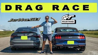 Tuned VW Jetta GLI vs Ford Mustang GT, it comes down to traction. Drag and Roll Race.