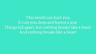 Mark Ronson - Nothing Breaks Like a Heart (ft. Miley Cyrus) ( Lyrics)