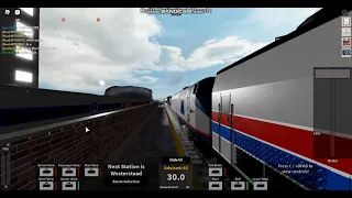 Rails Unlimited: Amtrak Train with Phase III and Phase VI engines working together at Khalifa