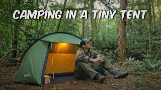 tiny tent camping - meat feast dinner cooked over a camp fire