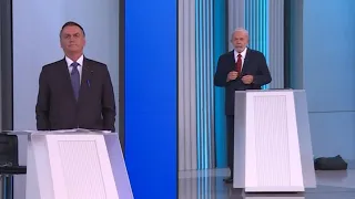 Brazil: presidential candidates Bolsonaro and Lula arrive on stage before final debate | AFP