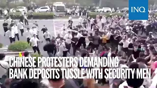 Chinese protesters demanding bank deposits tussle with security men