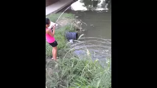 Little girl catches big bass