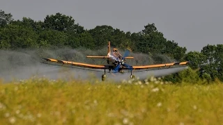 PZL-Mielec M-18 Dromader spraying late colza near Battonya, Hungary