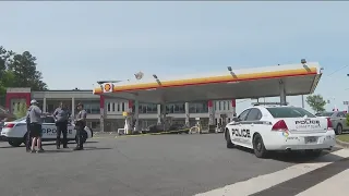 Murder suspect still at large in Gwinnett gas station shootout