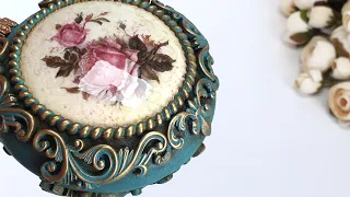 Christmas decoration in baroque style. Decoupage with rice paper. Modelling with polymer clay, Fimo