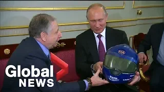 Vladimir Putin gets racing helmet as gift from FIA president