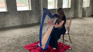 O Come O Come Emmanuel played on harp in empty stone church