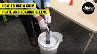 Loading Bulk Caulk with a Skim Plate and Rubber Loading Sleeve | Albion Engineering