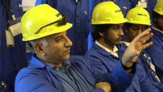 Young ADIPEC 2015 - Schlumberger