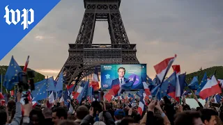 Paris voters react with joy, indifference to Macron victory