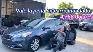 cuanto cuesta un carro inundado en la subasta de copart ya reparado?