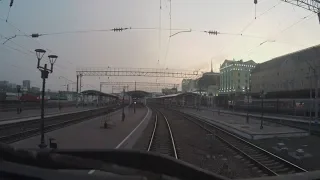Cab view train Russia. Train arrival in Krasnoyarsk by sunrise. Siberia