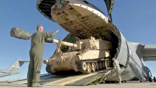 Huge US Transport Aircraft C-5 Galaxy Swallowing M109A6 Howitzer