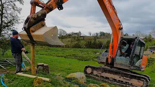 BUILDING A LIVESTOCK FENCE WITH A 13 TON DIGGER