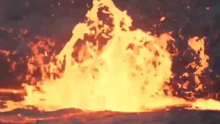 Man throws bucket of water into lava and causes violent eruption.