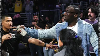 Shannon Sharpe and Tee Morant had to be separated during the Lakers-Grizzlies game 👀