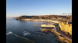 Aberystwyth seafront, town, harbour, and castle by drone.