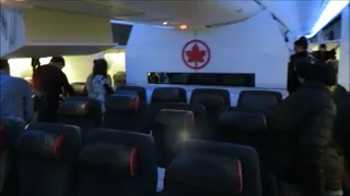 Air Canada B 777-200 LR YYZ - BOM Premium Economy review plus deicing and lounge