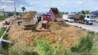 Completed Processing Filling Up The Land Next to the ring road, Bulldozer KOMATSU D31P, Dump Truck