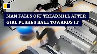 Man in China falls off treadmill after girl pushes exercise ball towards it