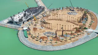 2065,Now the center of the circle pours more sand+truck shacman unloading sand with wheelloader push