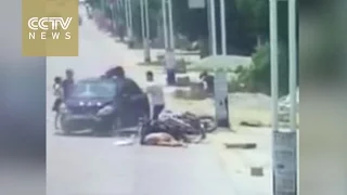 Car hits two motorcycles while changing lanes