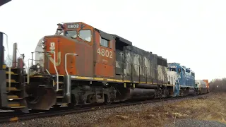 Awesome Power Lashup on a Long Stack Train CN 120 w/DPU Rolling thru Sackville, NB