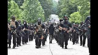 Armed Black Militia Marches On Confederate Monument
