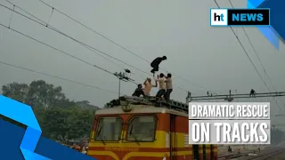 Watch: Officials rescue man dangling from overhead wire at MP’s railway station