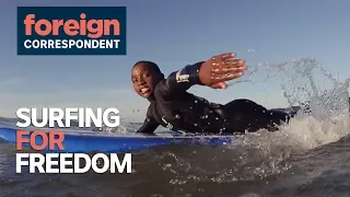 Riding waves to be free from poverty and crime in South Africa (2016) | Foreign Correspondent