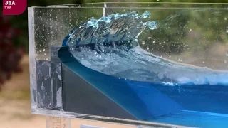 Wave tank demonstration showing the impact of coastal defences on flood risk