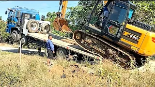 SANNY BACKHOE 135/ carga descarga Shelp loading truck, transfer to another site..