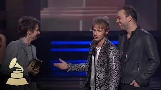 Muse accepting the GRAMMY for Best Rock Album at the 53rd GRAMMY Awards | GRAMMYs
