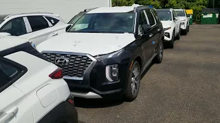 row of new Hyundai's.  end with the 2022 Santa fe.