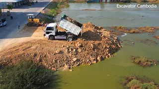 New Project 5TON Truck Unloading Dirt And KOMATSU D31P Dozer Working Pushing Making Road Cross Water