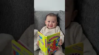 Baby Theo loves books