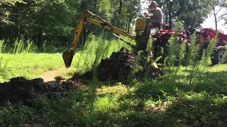 Rural King Rk37 with backhoe attachment