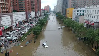 Thousands evacuated from flood-ravaged regions in central China, death toll rises