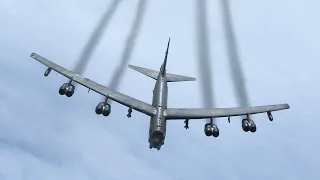 Old Massive US B-52 Leaves Smoke Trails from Jet Engines During Air Refueling