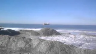 Liberty Island dredge pumping sand onto the beach in Cardiff