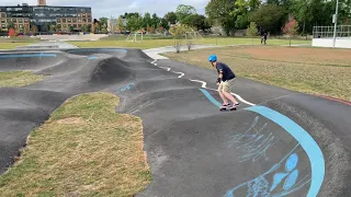 Shredding a pump track in Cambridge MA with my Landyachtz Dugout.